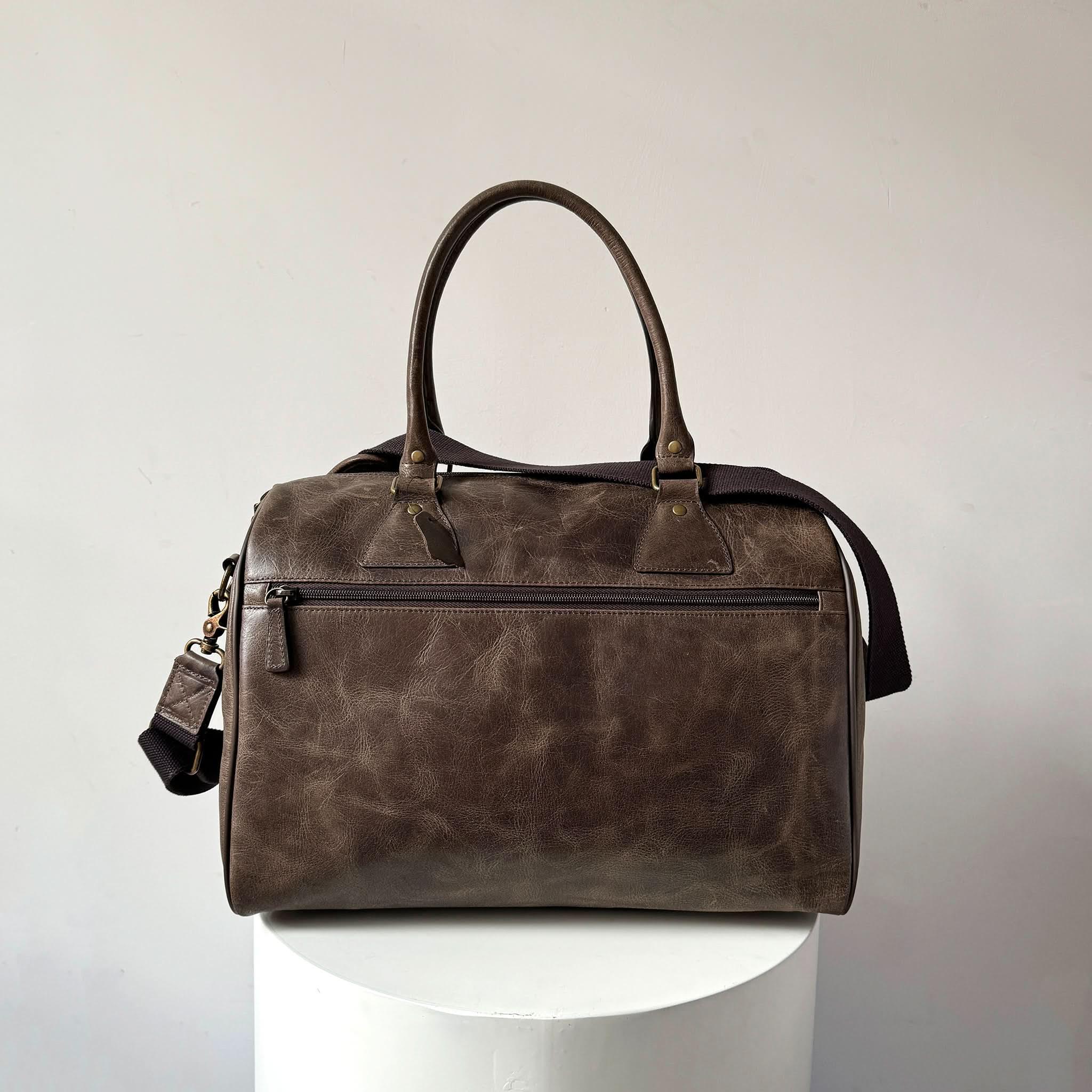 Crazy Horse leather weekender travel bag with antique brass hardware