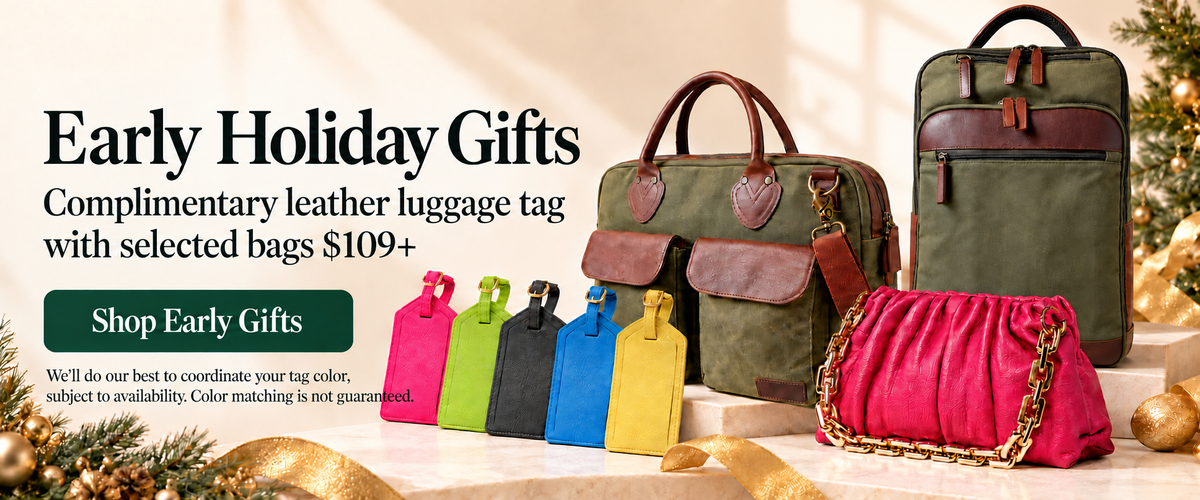 Holiday gift promotional banner featuring a green leather luggage tag, an olive green backpack, and a bright pink chain-strap clutch bag, with smaller luggage tags in multiple colors lined up below. Text on the left reads 'Early Holiday Gifts' and 'Complimentary leather luggage tag with selected bags $109+'.