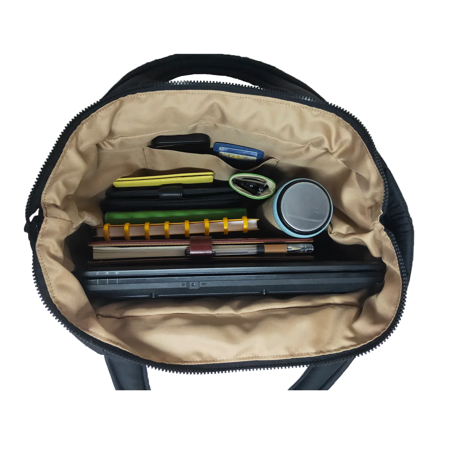 Organized interior of quilted nylon tote bag for laptop and daily essentials
