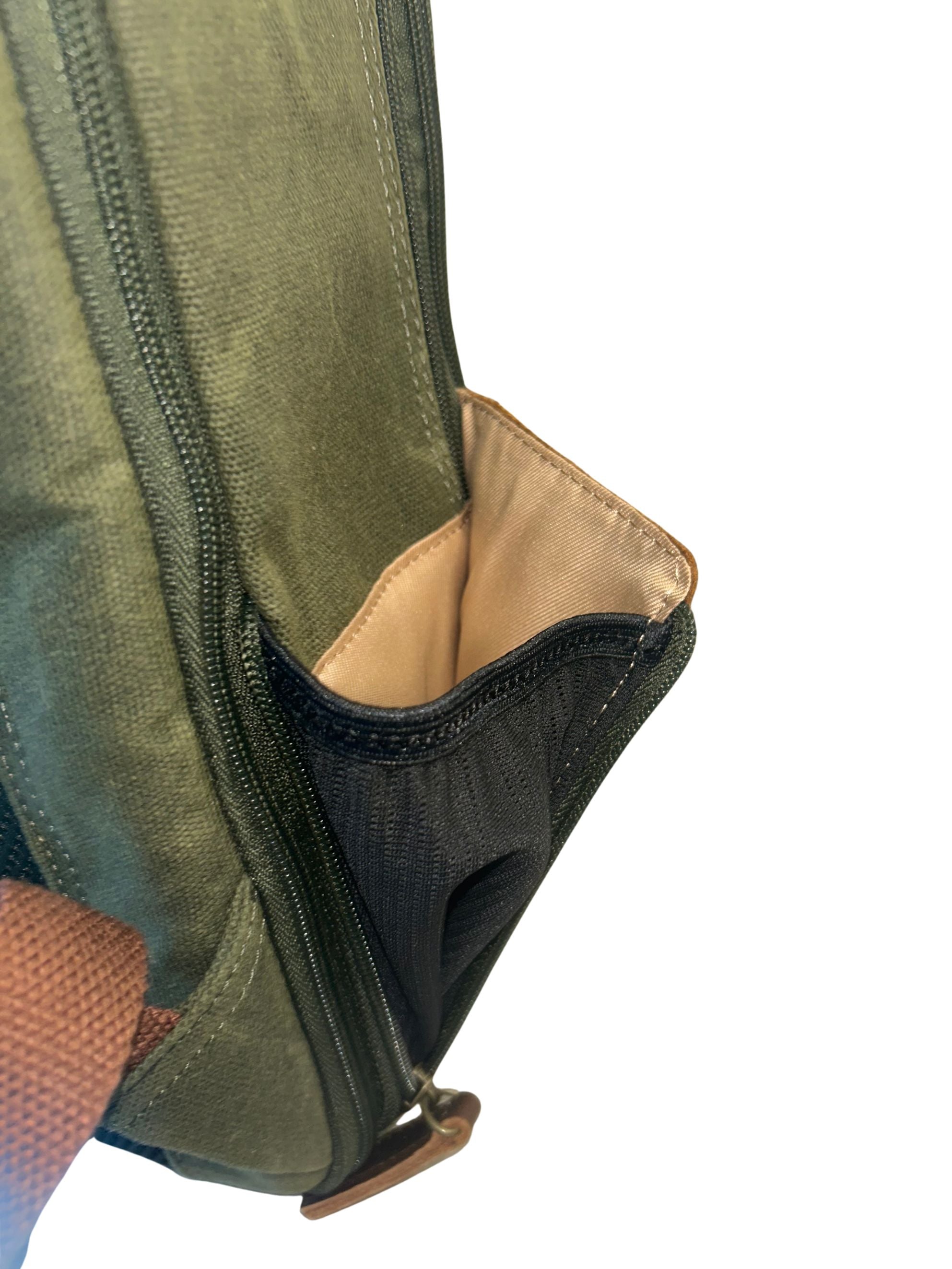 Maxwell 16-inch waxed canvas laptop backpack zippered side pocket with interior organizer