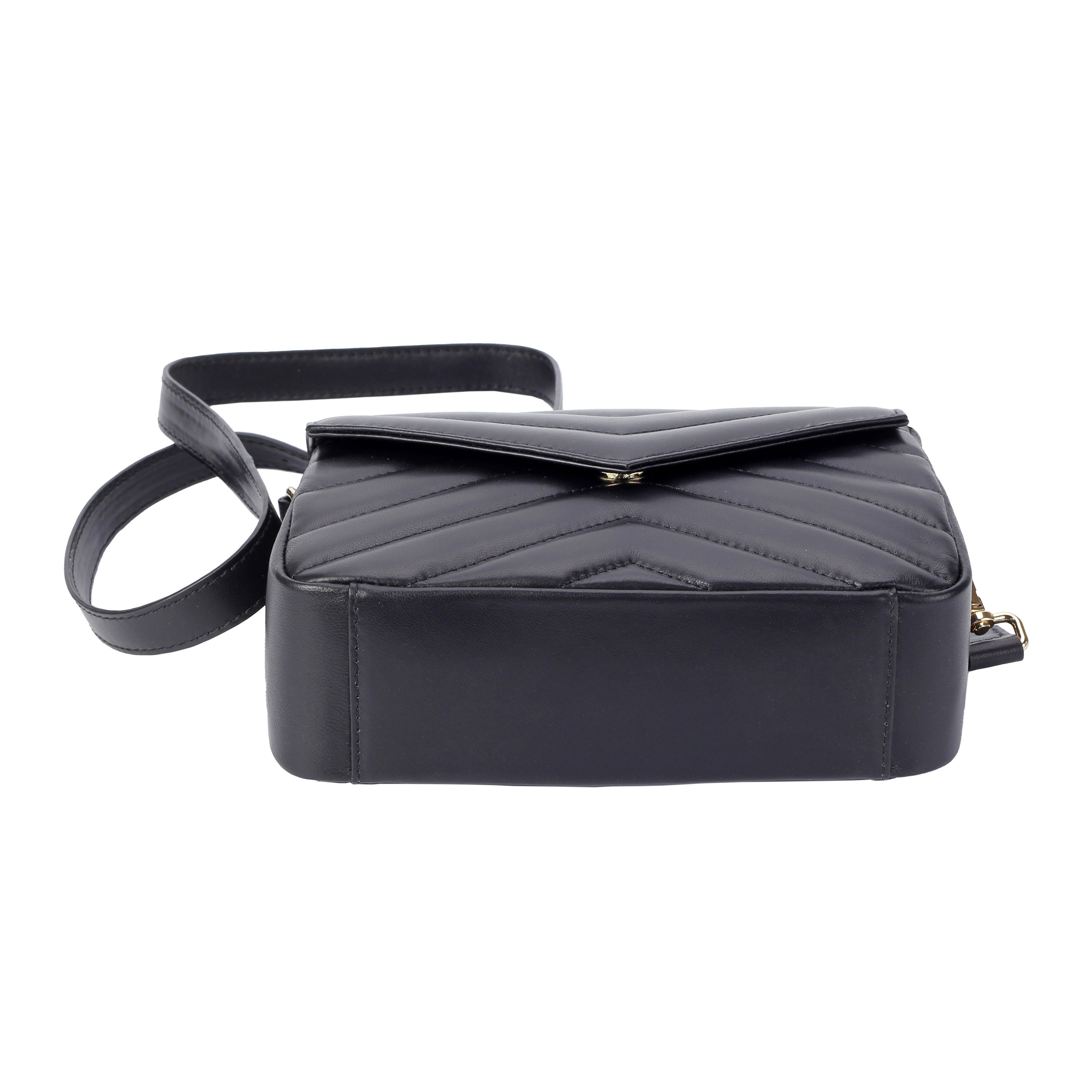 Black lambskin mini flap crossbody bag showing quilted texture and magnetic closure