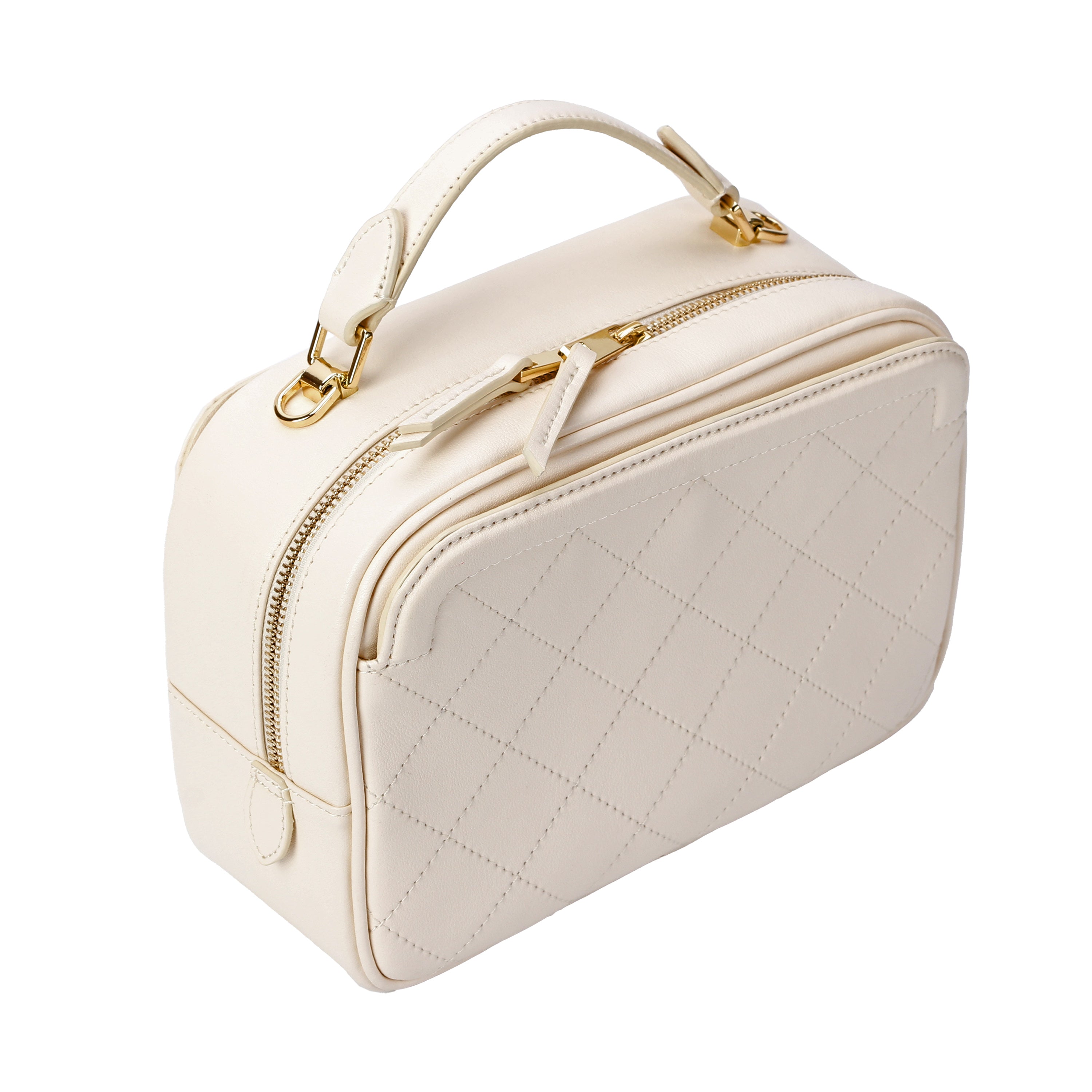 Close-up of leather handle and gold hardware on ivory camera bag