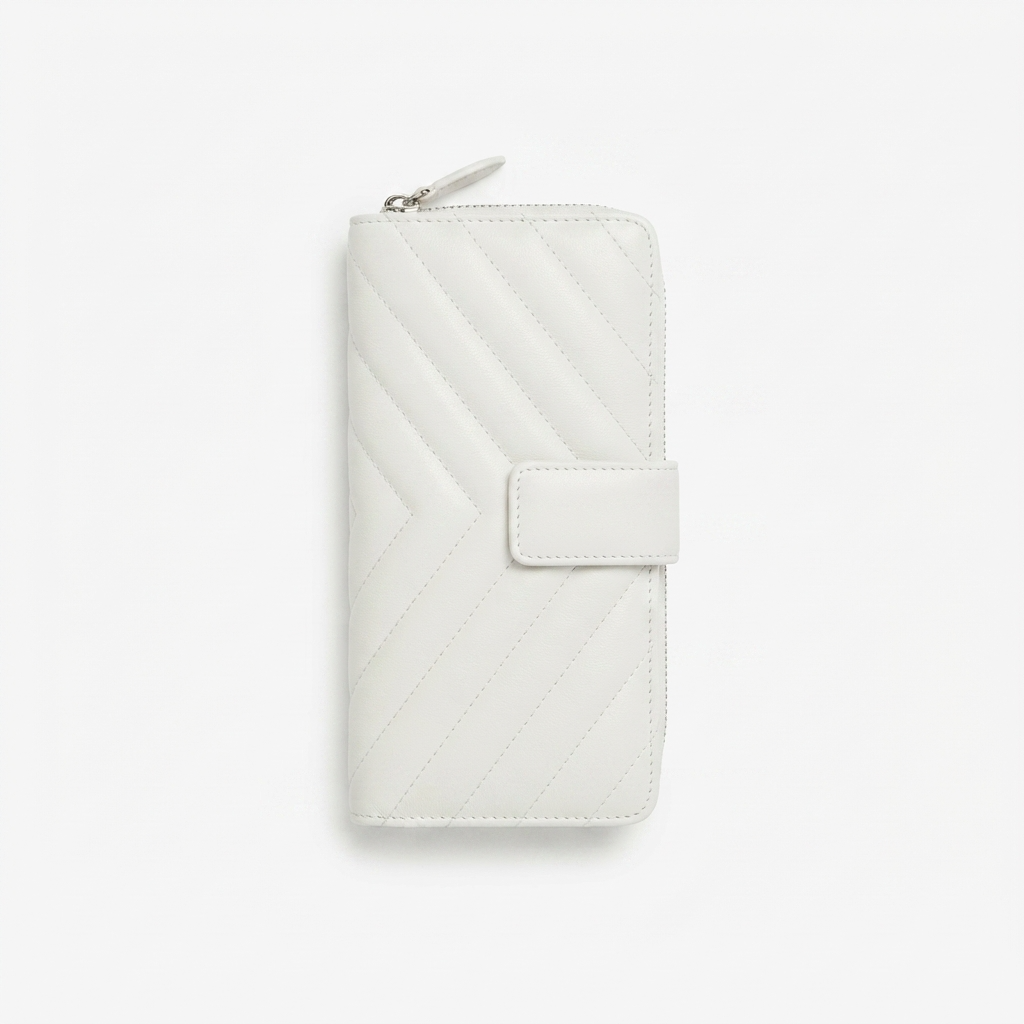 A white New Zealand lambskin leather zip-around wallet with a chevron quilted pattern and a snap-button closure