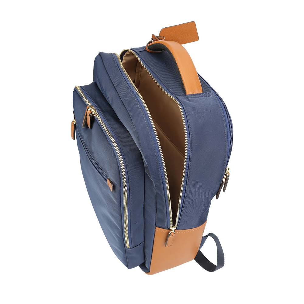 Side view of men’s navy nylon and leather backpack with adjustable straps