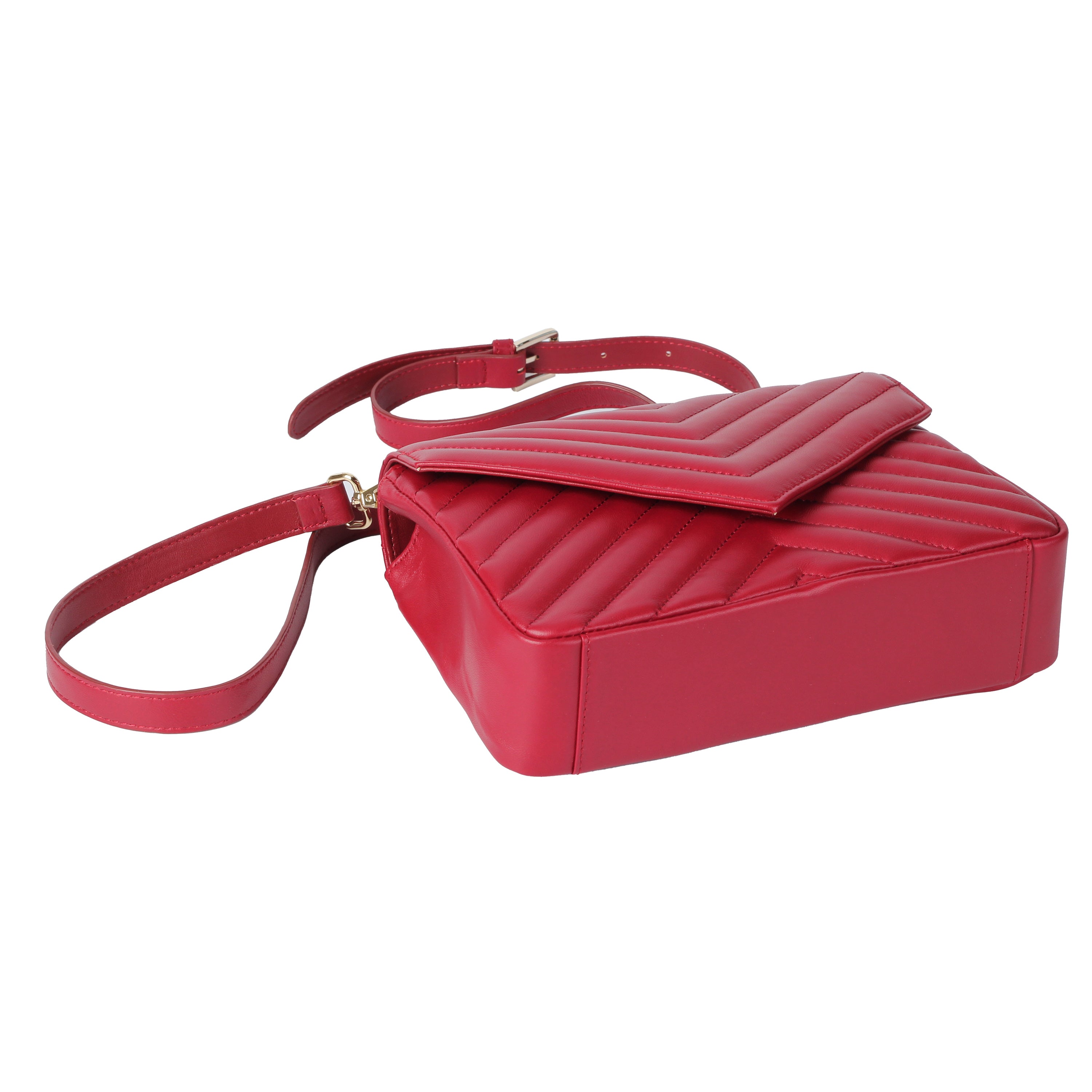 Detail of red lambskin quilted texture with gold hardware