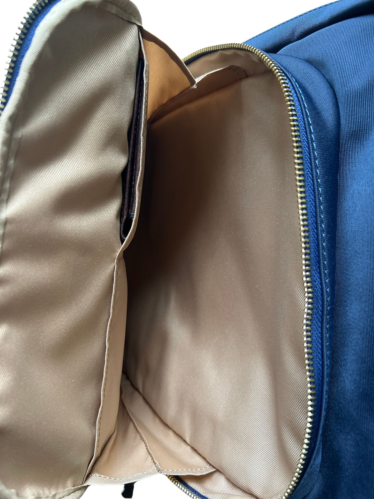 16-inch nylon laptop backpack front zip compartment with two organizer pockets and passport wallet
