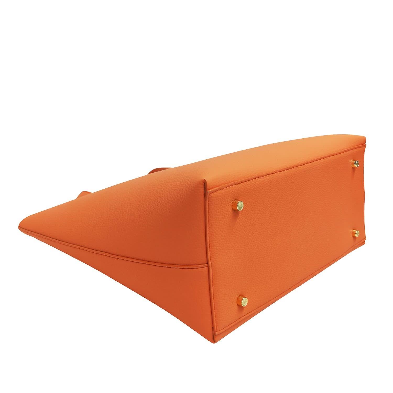 Bottom view of orange pebbled leather tote bag with structured base