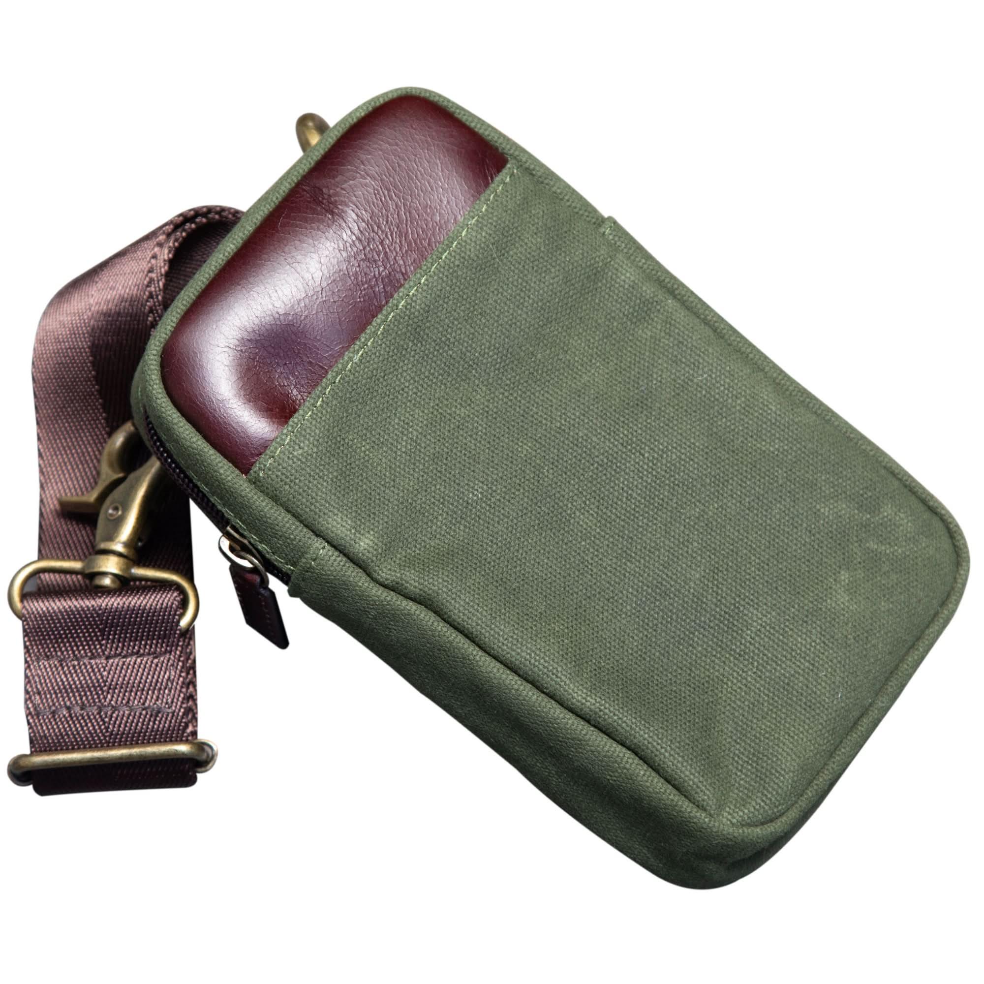 Front view of waxed canvas phone case wallet with belt loop and leather trim