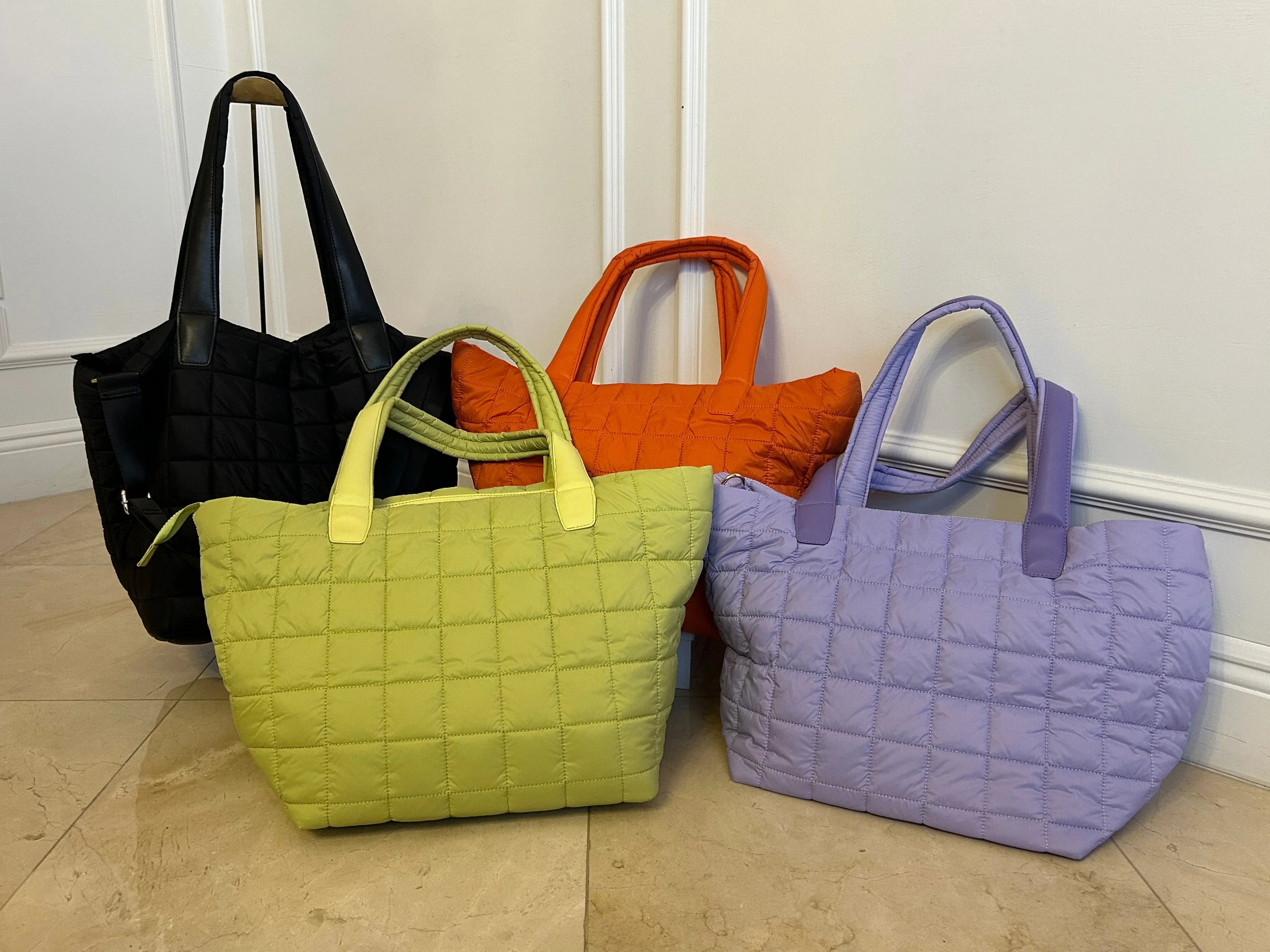 Quilted nylon tote bag color options in black orange green and purple