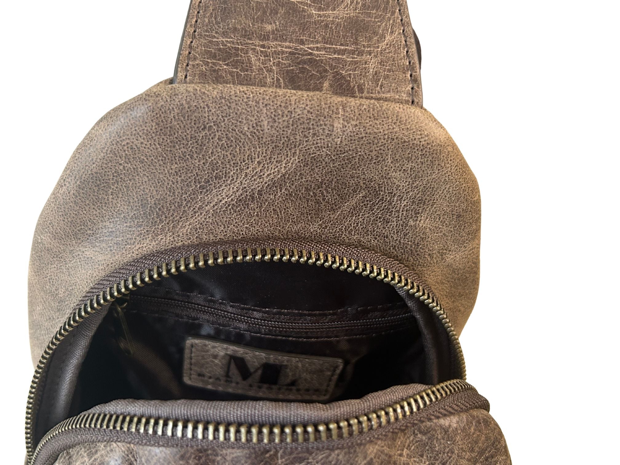 Small Crazy Horse full-grain leather sling bag interior zippered pocket