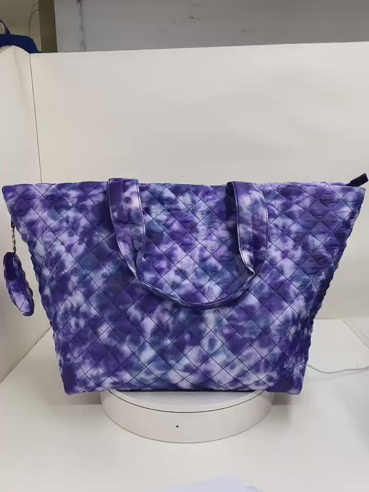 Blue quilted Floral nylon travel tote bag video showing size and shape