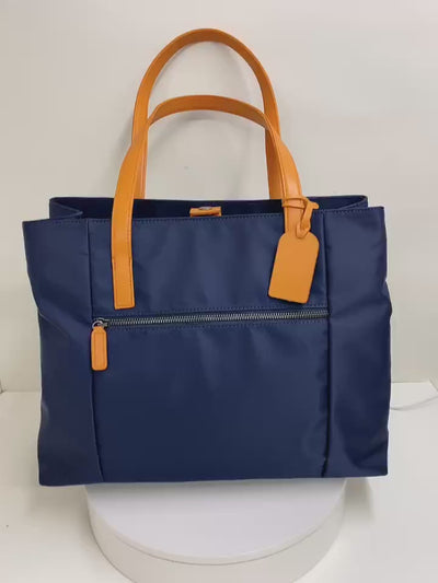 Lightweight 15 inch laptop tote bag video showing work and travel features