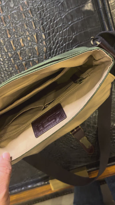 Video showing Maxwell compact messenger bag storage and carry details