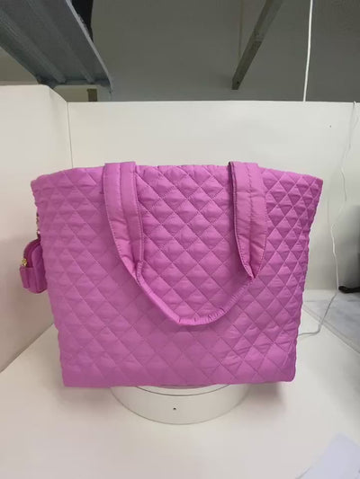Pink quilted nylon travel tote bag video with detachable pouch