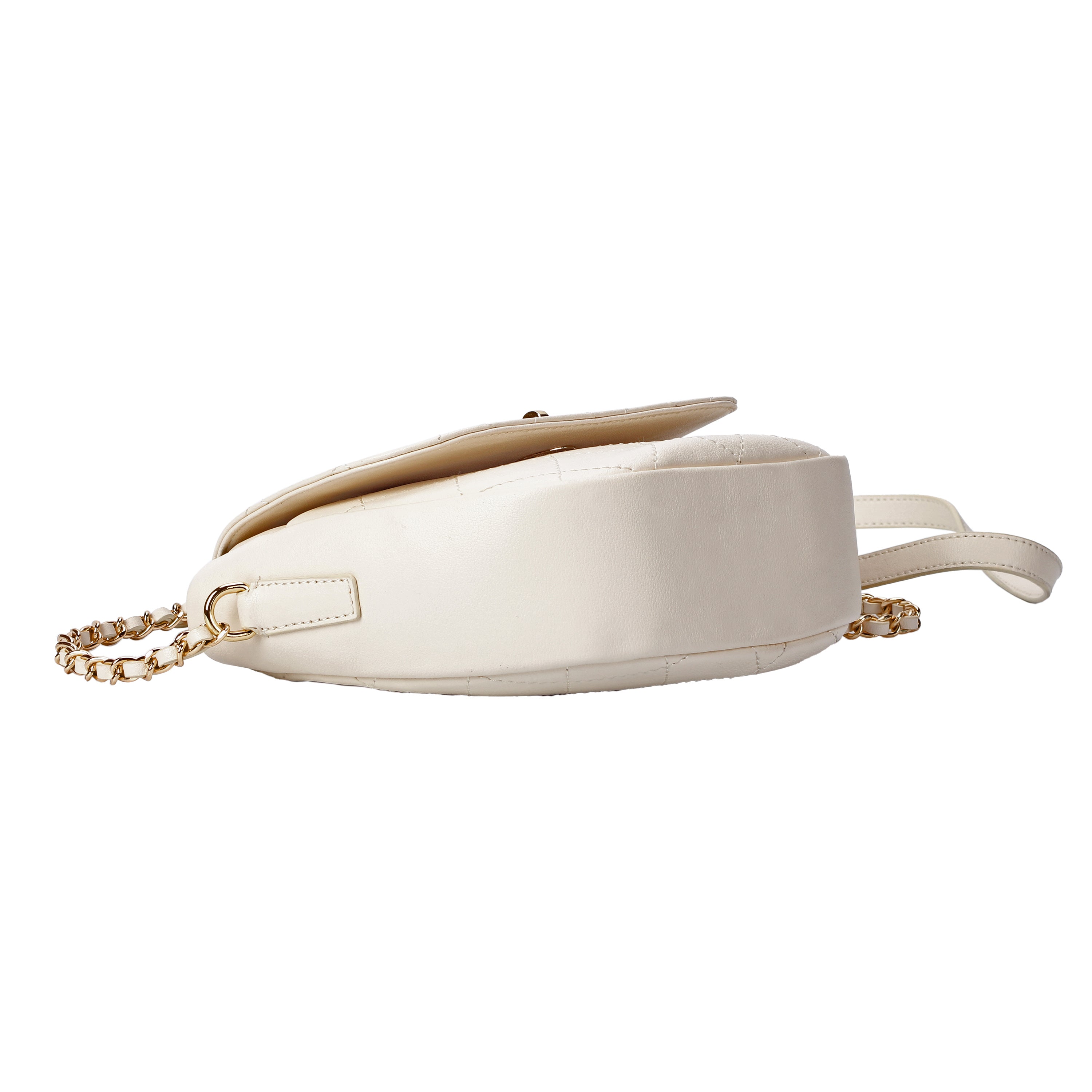Bottom of white quilted leather crossbody bag showing structured base
